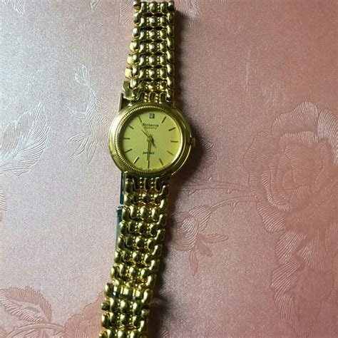 Gold Crown Watch .